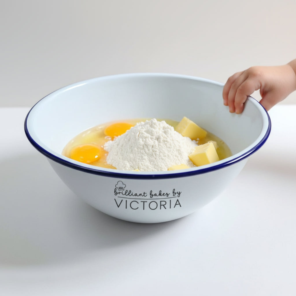 White bowl with blue rim and 'Brilliant Bakes by Victoria' text on a white background
